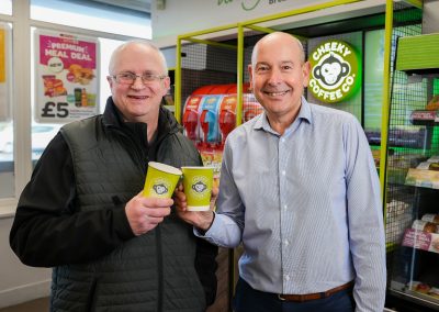 Cliff Isherwood, SPAR independent retailer, endorsing Cheeky Coffee with Peter Dodding, James Hall & Co. Ltd