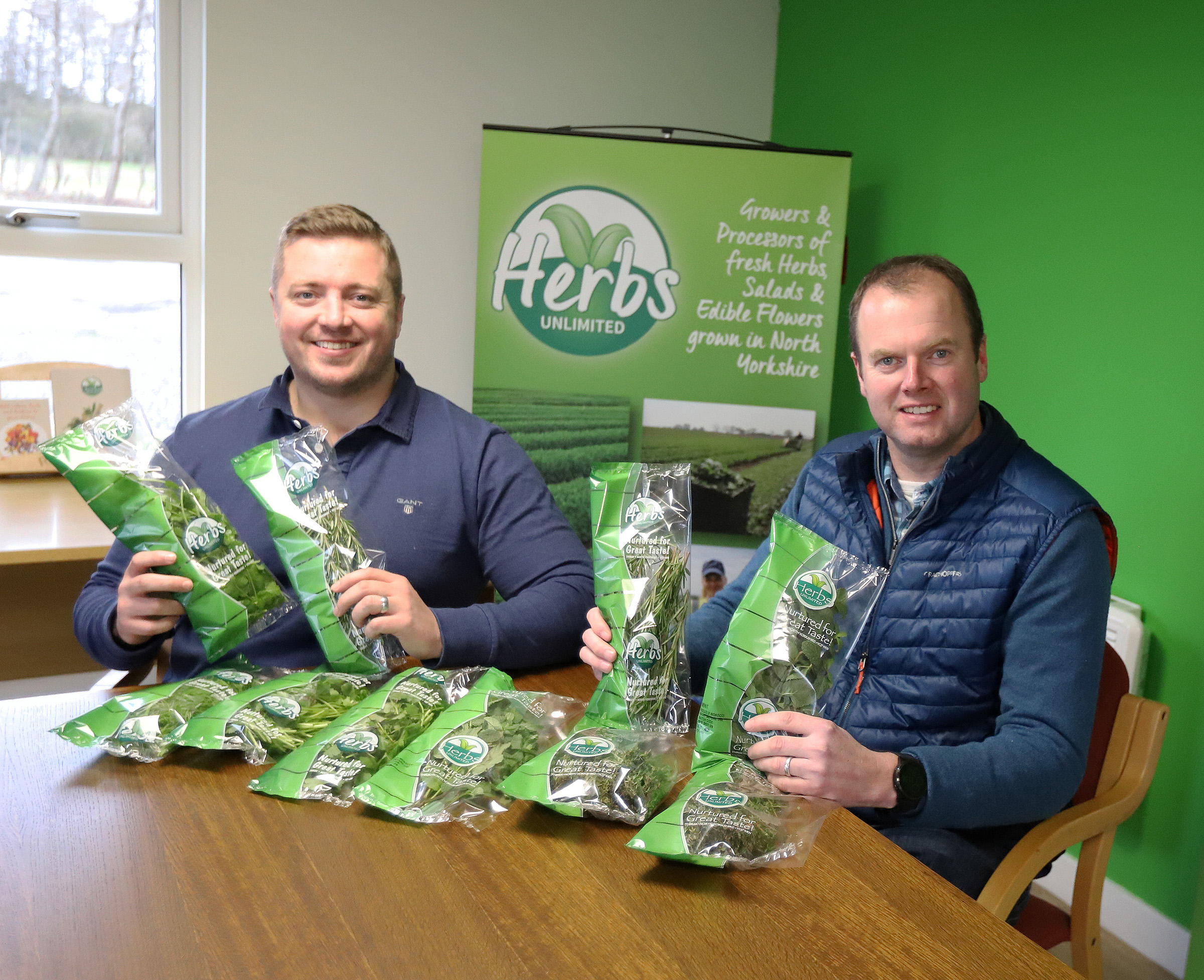 Herbs Unlimited James Hall 1_edited Wilf Whittle, Fresh Trading Manager at James Hall & Co. Ltd, with Philip Dodd, Managing Director of Herbs Unlimited, as they launch the new lines of fresh herbs in SPAR North of England stores.
