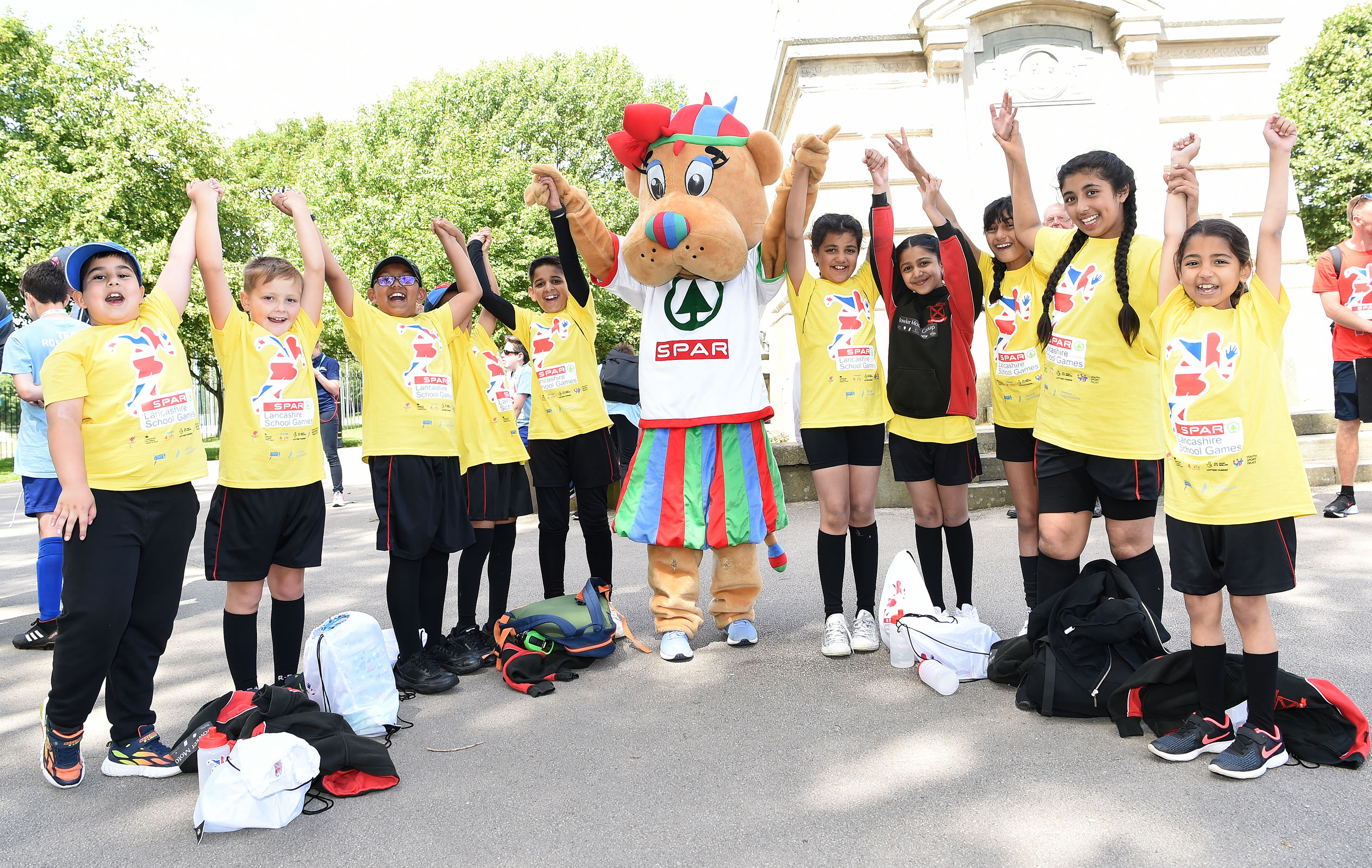 Lancashire School Games - SPAR mascot and children