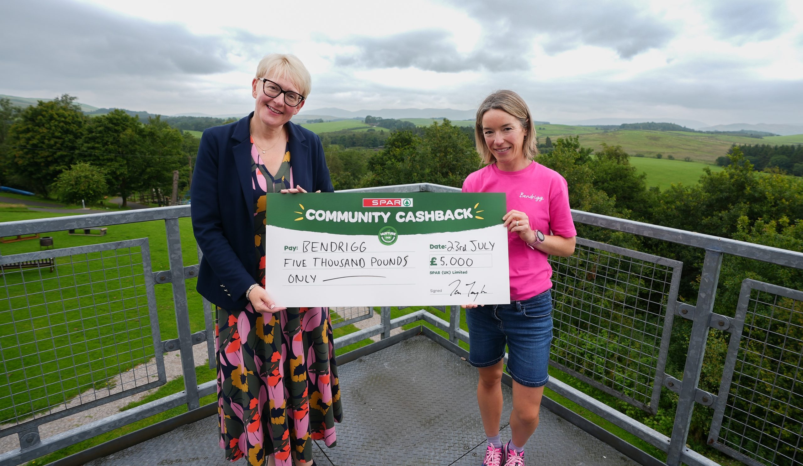 SPAR Community Cashback Bendrigg Fiona Drummond, SPAR Company Stores Director at James Hall & Co. Ltd, SPAR’s primary retailer, wholesaler, and distributor for the North of England, with the charity’s Fundraising Manager Lizzie Feltoe at Bendrigg’s outdoor activity centre.